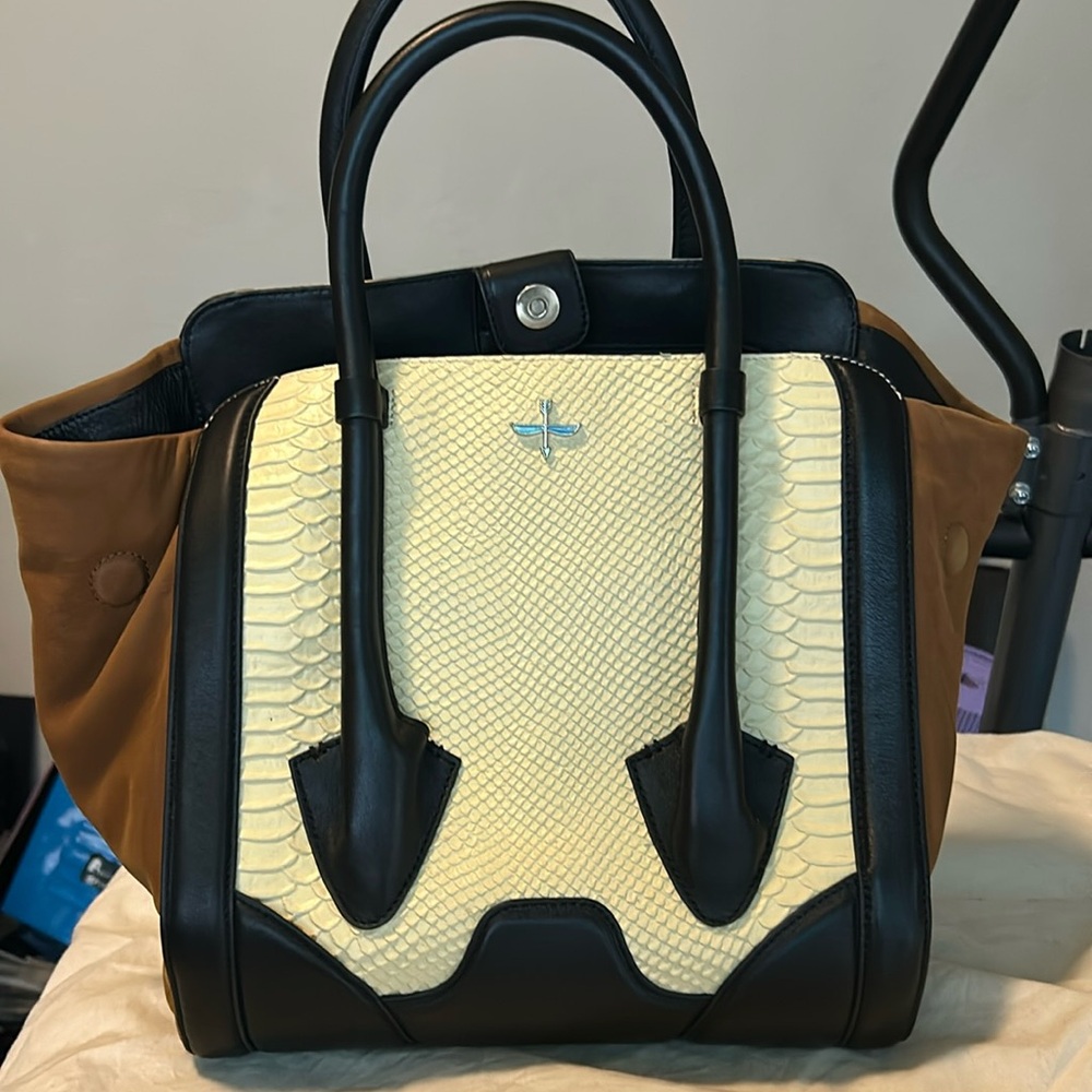 Gently used Pour La Victoire butler bag